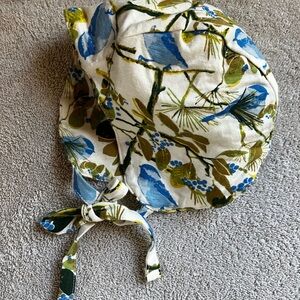 Kate Quinn Cream Bonnet with Blue Birds and Olive Green Foliage